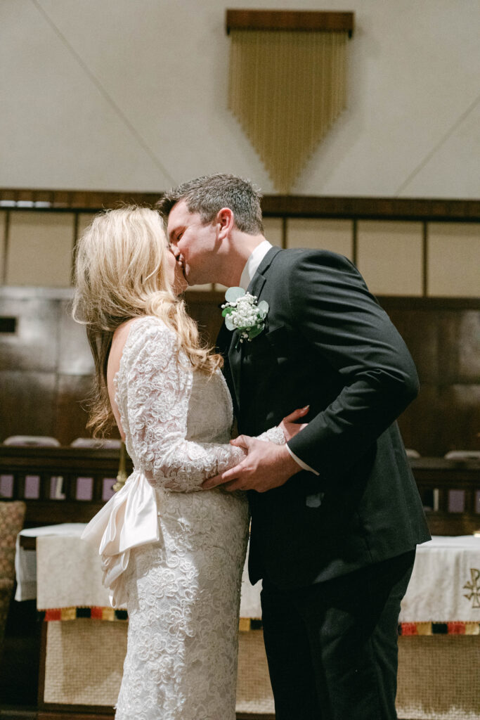 Couple embracing during intimate wedding in Kannapolis, NC