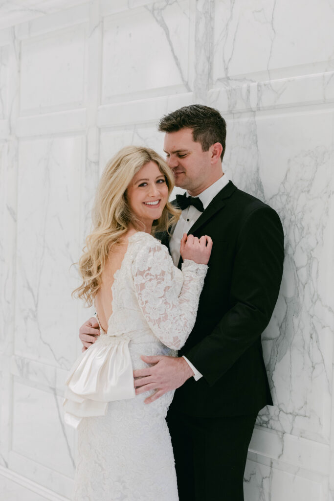 Bride and groom embracing during intimate wedding ceremony in Kannapolis
