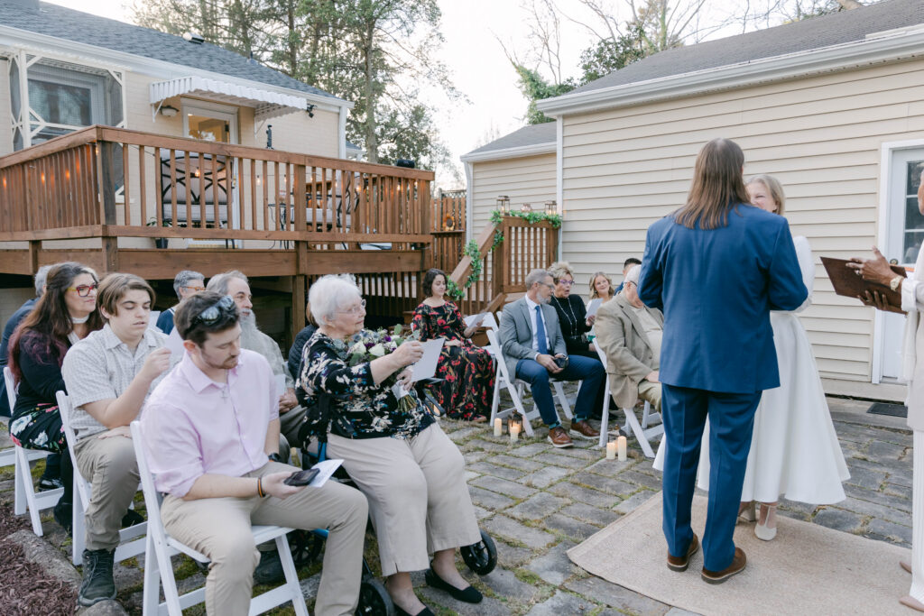guests saying a vow with the couple