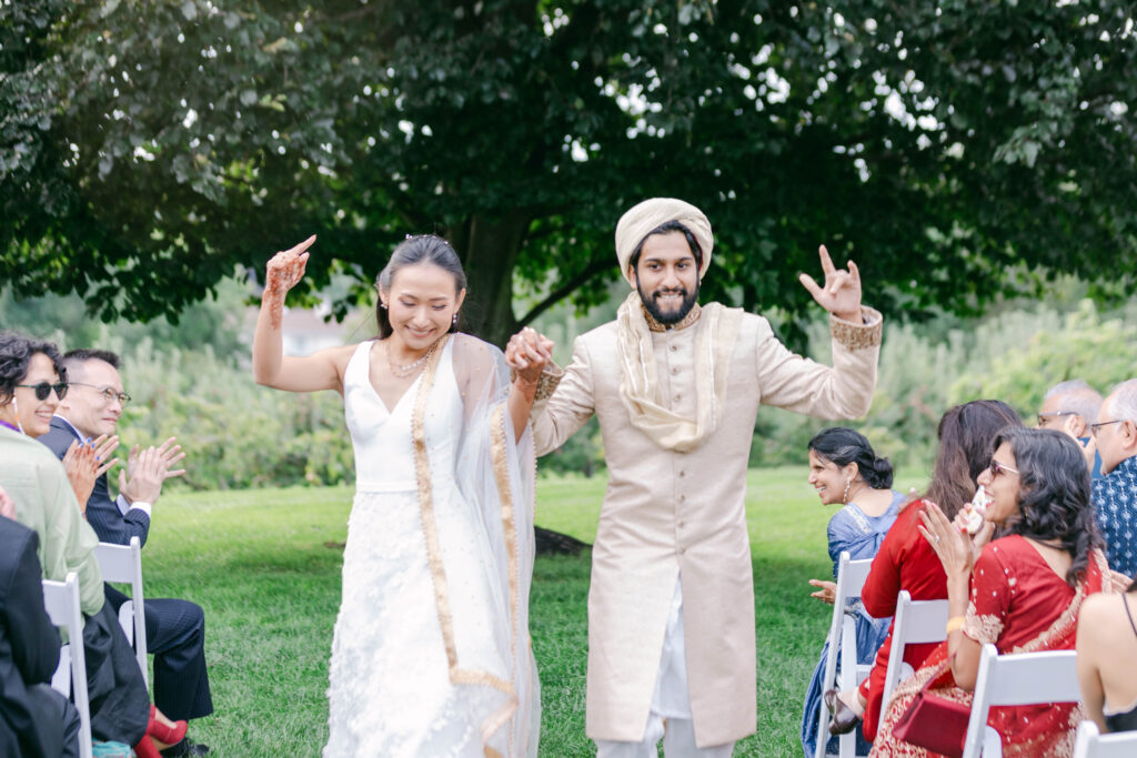 couple dancing down the aisle
